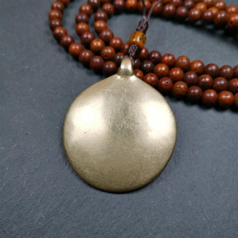 This unique tibetan melong badge was collected from Baiyu Monastery for 30 years. It's a Astrology Protective Amulet Pendant,made of cold iron. The pattern is Tibetan Budhist Protective Amulet Pendant - SIPAHO(srid pa ho).