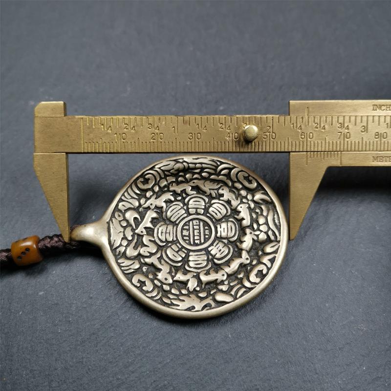 This unique tibetan melong badge was collected from Baiyu Monastery for 30 years. It's a Astrology Protective Amulet Pendant,made of cold iron. The pattern is Tibetan Budhist Protective Amulet Pendant - SIPAHO(srid pa ho).