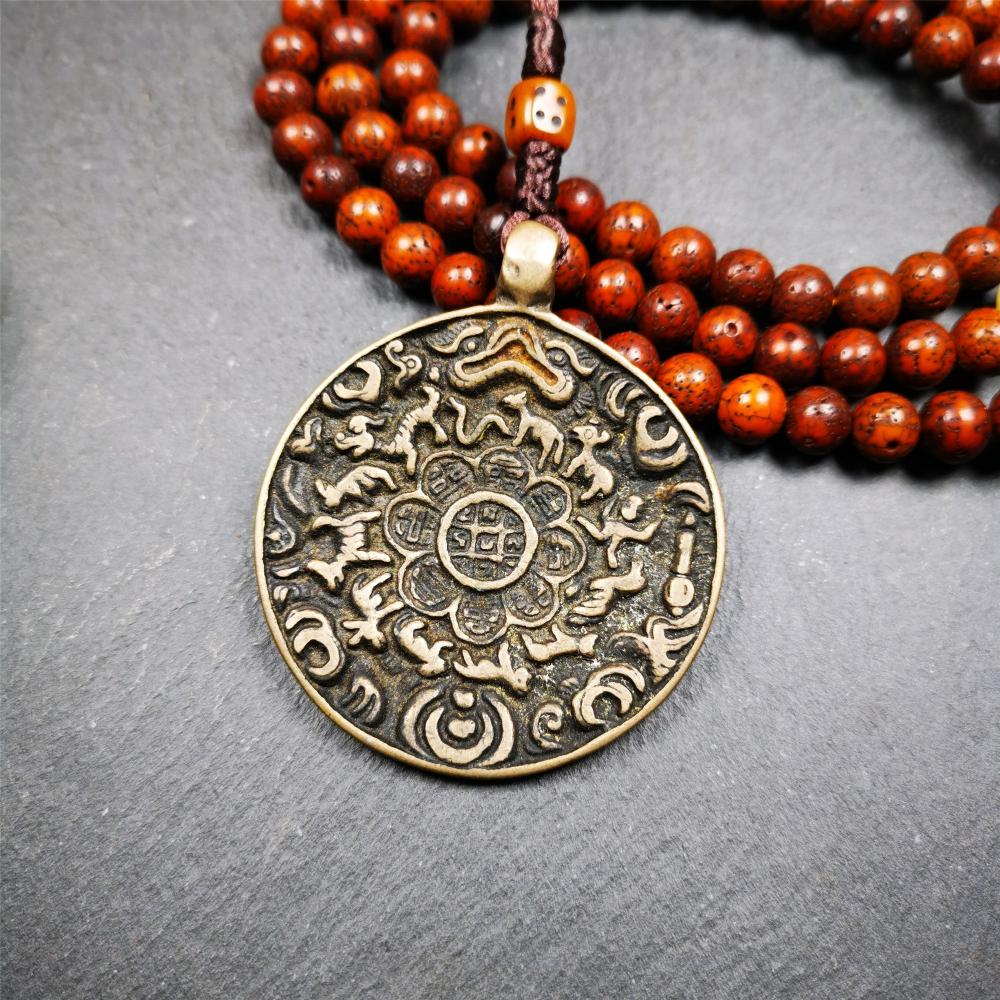 This unique tibetan calendar melong badge was collected from Kathok Monastery,about 50 years old. It's a Astrology Protective Amulet Pendant,made of thokcha,the pattern is Tibetan Budhist Protective Amulet Pendant - SIPAHO(srid pa ho).
