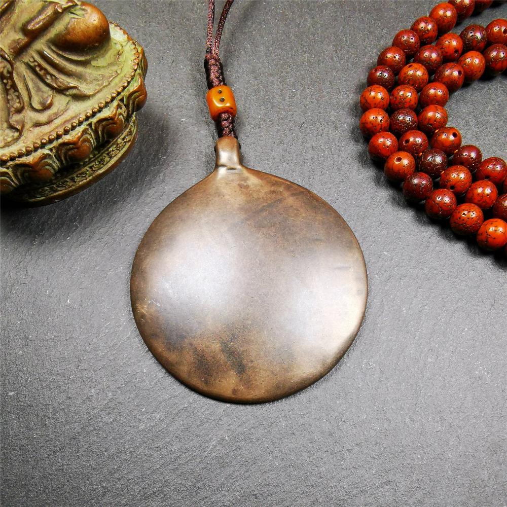This unique tibetan melong badge was collected from Baiyu Monastery for 30 years. It's a Astrology Protective Amulet Pendant,made of copper. The pattern is Tibetan Budhist Protective Amulet Pendant - SIPAHO(srid pa ho).  SIPAHO Melong Amulet on the cord,when on a go or travelling, it's placed as a waist badge. You can make it into pendant,keychain, bag hanging,or just put it on your desk,as an ornament.