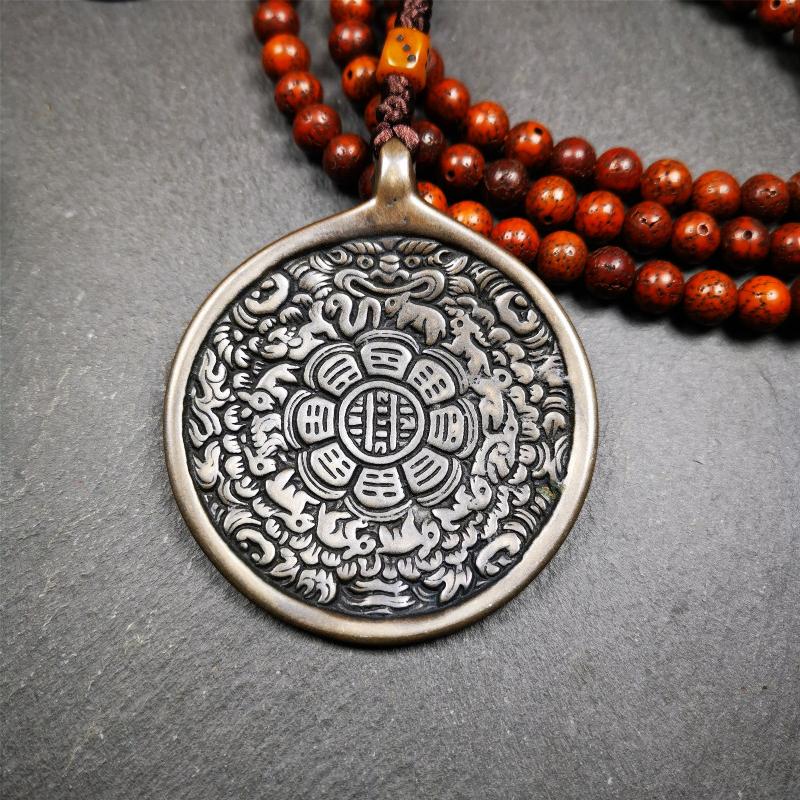 This unique tibetan melong badge was collected from Baiyu Monastery for 30 years. It's a Astrology Protective Amulet Pendant,made of copper. The pattern is Tibetan Budhist Protective Amulet Pendant - SIPAHO(srid pa ho).  SIPAHO Melong Amulet on the cord,when on a go or travelling, it's placed as a waist badge. You can make it into pendant,keychain, bag hanging,or just put it on your desk,as an ornament.