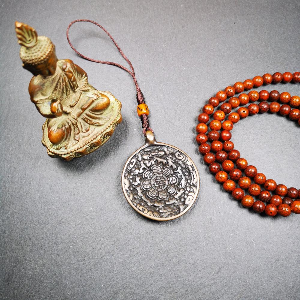 This unique tibetan melong badge was collected from Baiyu Monastery for 30 years. It's a Astrology Protective Amulet Pendant,made of cold iron. The pattern is Tibetan Budhist Protective Amulet Pendant - SIPAHO(srid pa ho).