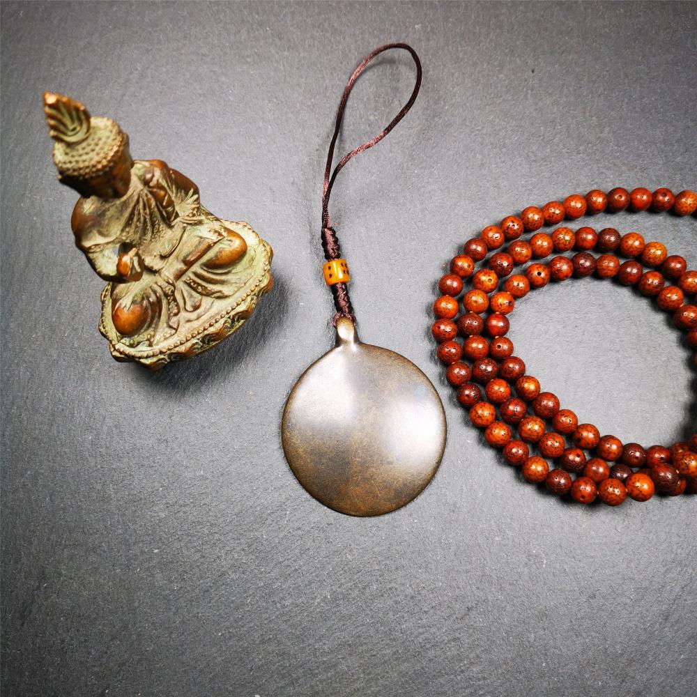 This unique tibetan melong badge was collected from Baiyu Monastery for 30 years. It's a Astrology Protective Amulet Pendant,made of cold iron. The pattern is Tibetan Budhist Protective Amulet Pendant - SIPAHO(srid pa ho).