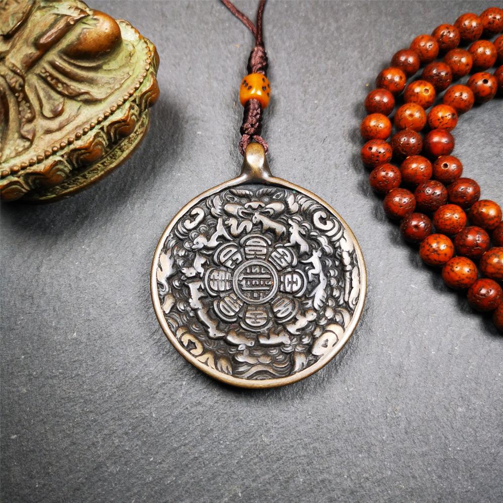 This unique tibetan melong badge was collected from Baiyu Monastery for 30 years. It's a Astrology Protective Amulet Pendant,made of cold iron. The pattern is Tibetan Budhist Protective Amulet Pendant - SIPAHO(srid pa ho).
