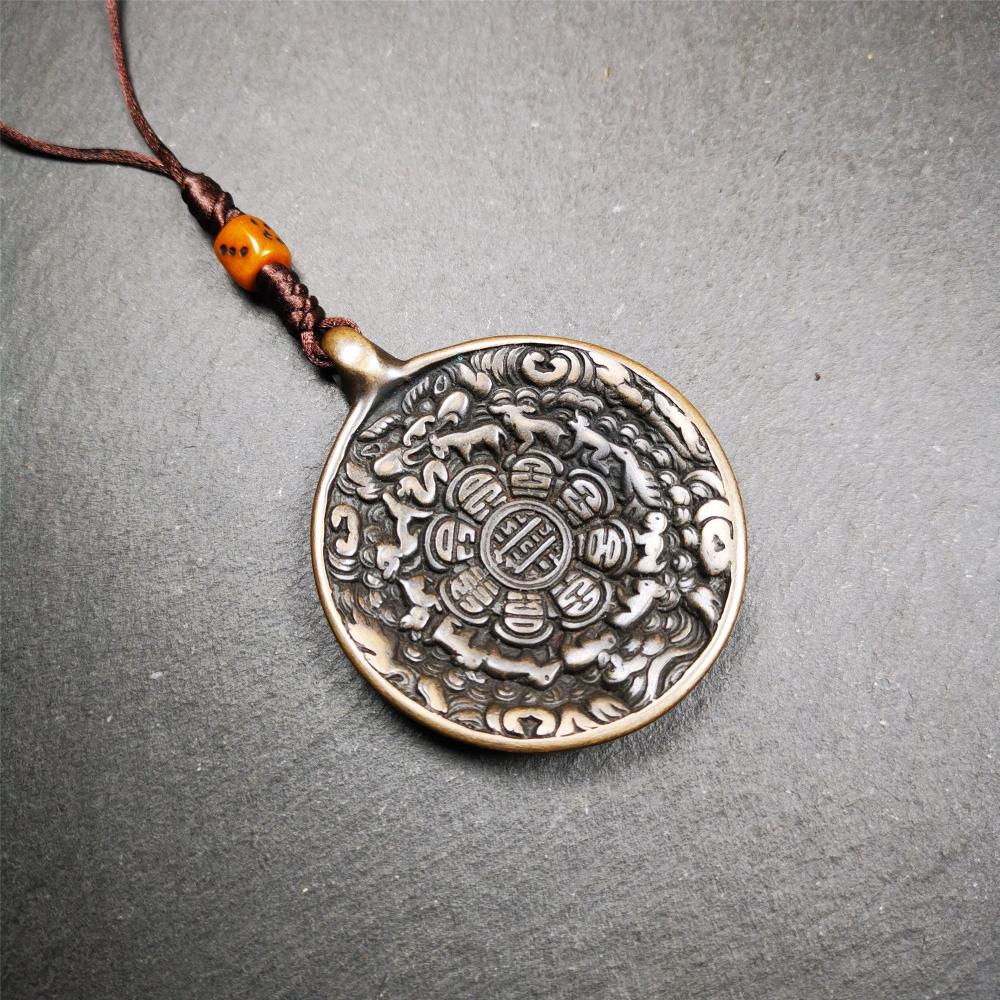 This unique tibetan melong badge was collected from Baiyu Monastery for 30 years. It's a Astrology Protective Amulet Pendant,made of cold iron. The pattern is Tibetan Budhist Protective Amulet Pendant - SIPAHO(srid pa ho).