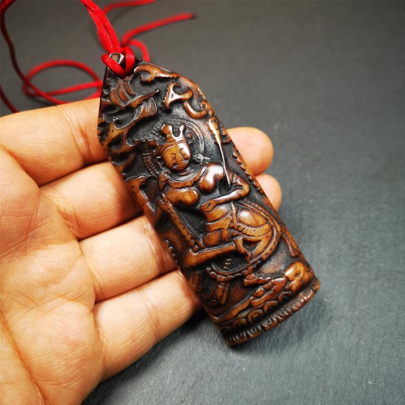 This bone carved Troma Nagmo amulet was collected from Gerze Tibet, hand carved by Tibetan Craft man,about 30 years old. Troma Nagmo literally means the Black Wrathful Lady. She is included in the Dharmapala pantheon as a form of Vajravarahi.