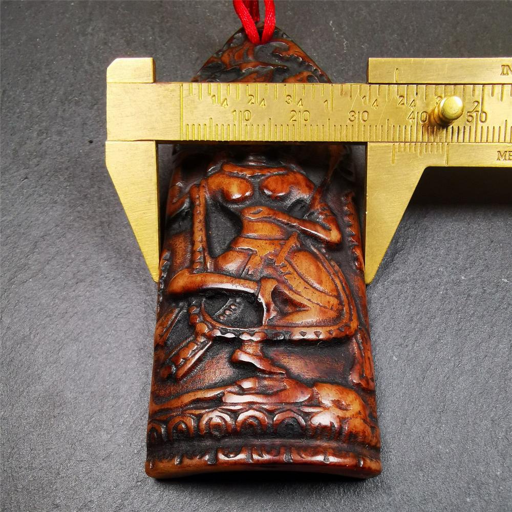This bone carved Troma Nagmo amulet was collected from Gerze Tibet, hand carved by Tibetan Craft man,about 30 years old. Troma Nagmo literally means the Black Wrathful Lady. She is included in the Dharmapala pantheon as a form of Vajravarahi.