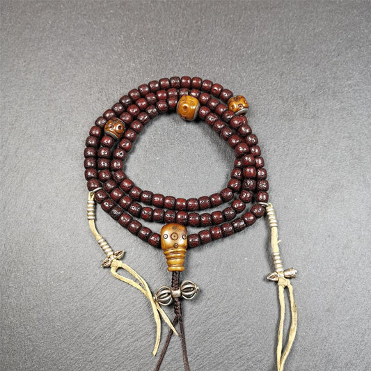 This mala is made by Tibetan craftsmen and come from Hepo Town, Baiyu County,Tibet, the birthplace of the famous Tibetan handicrafts,about 30 years old,blessed by a lama in Baiyu Monastery. It's composed of 108 pcs 8mm lotus seed beads,then add some old bone beads,1 pair of silver bead counters,and silver guru bead,vajra pandent