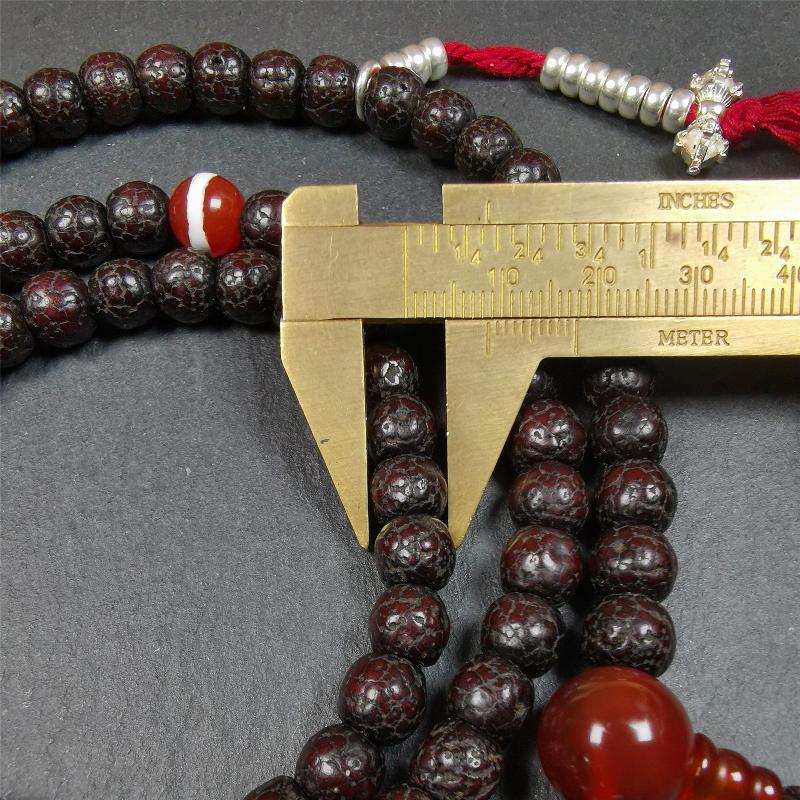 This mala is made by Tibetan craftsmen and come from Hepo Town, Baiyu County,Tibet, the birthplace of the famous Tibetan handicrafts. It's composed of 108 pcs 8mm lotus seed beads,with agate beads,and silver bead counters.