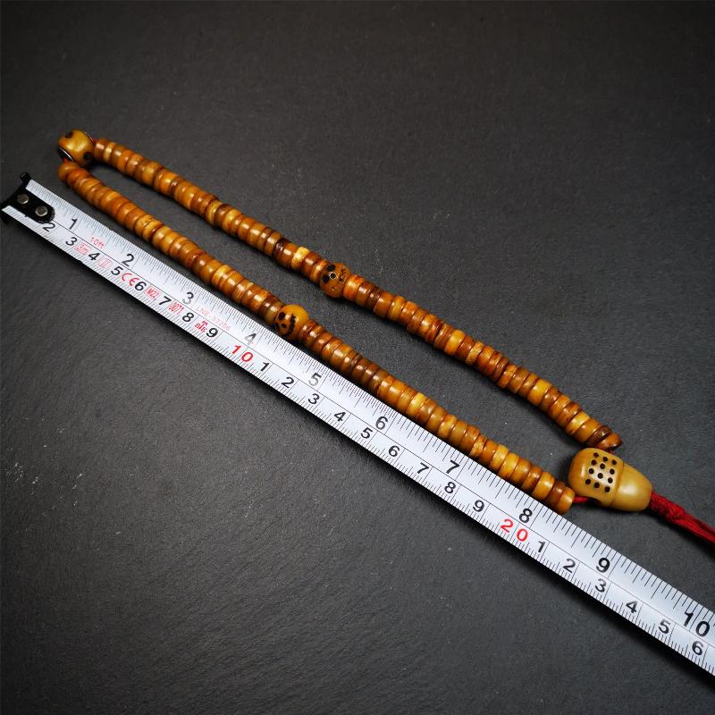 This yak bone mala was handmade from tibetan crafts man in Baiyu County,about 30 years old. It's composed of 108 pcs 9mm bone beads,with bone carved beads,guru bead.