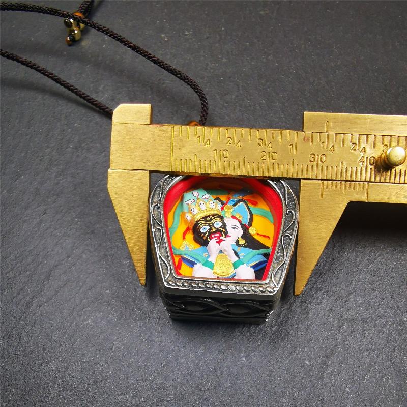 This Drashi Lhamo Gau box is made by Tibetan craftsmen in Hepo Township, Baiyu County,filled in a unique fashion Drashi Lhamo Tsa Tsa - Tibetan girl wearing her mask,made of pottery clay,hand painted.