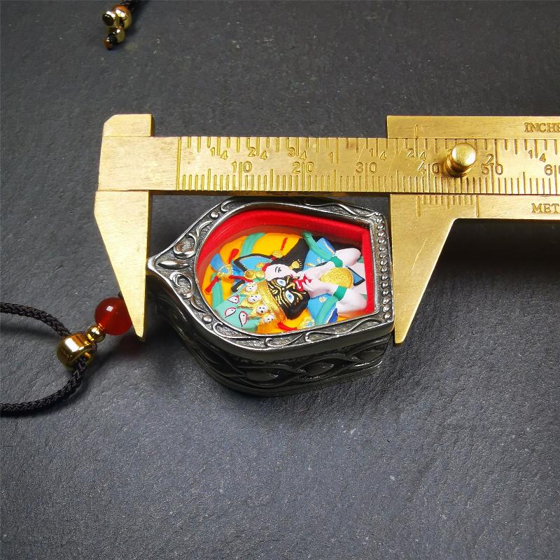 This Drashi Lhamo Gau box is made by Tibetan craftsmen in Hepo Township, Baiyu County,filled in a unique fashion Drashi Lhamo Tsa Tsa - Tibetan girl wearing her mask,made of pottery clay,hand painted.