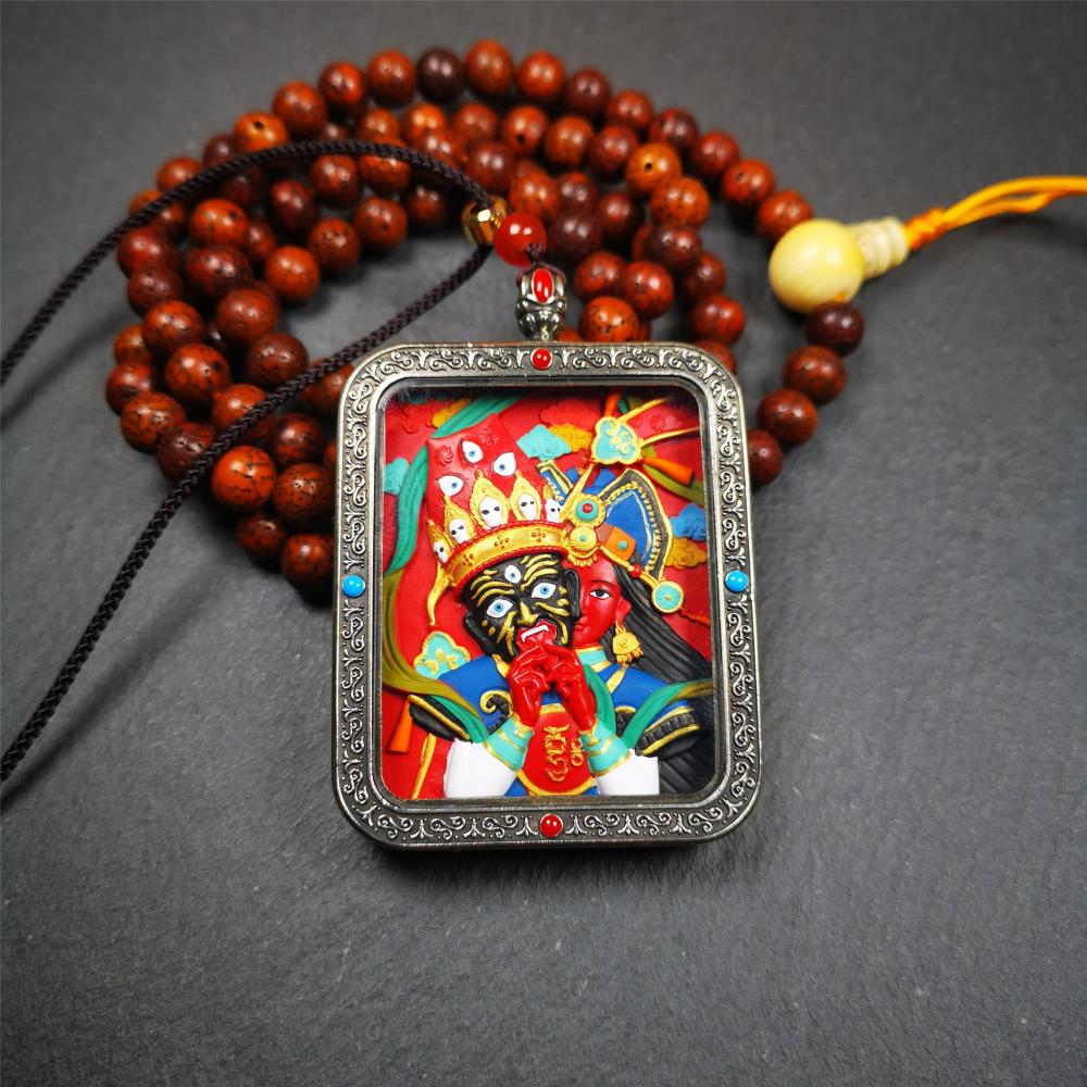 This Drashi Lhamo Gau box is made by Tibetan craftsmen in Hepo Township, Baiyu County,filled in a unique fashion Drashi Lhamo Tsa Tsa - Tibetan girl wearing her mask,made of pottery clay,hand painted.