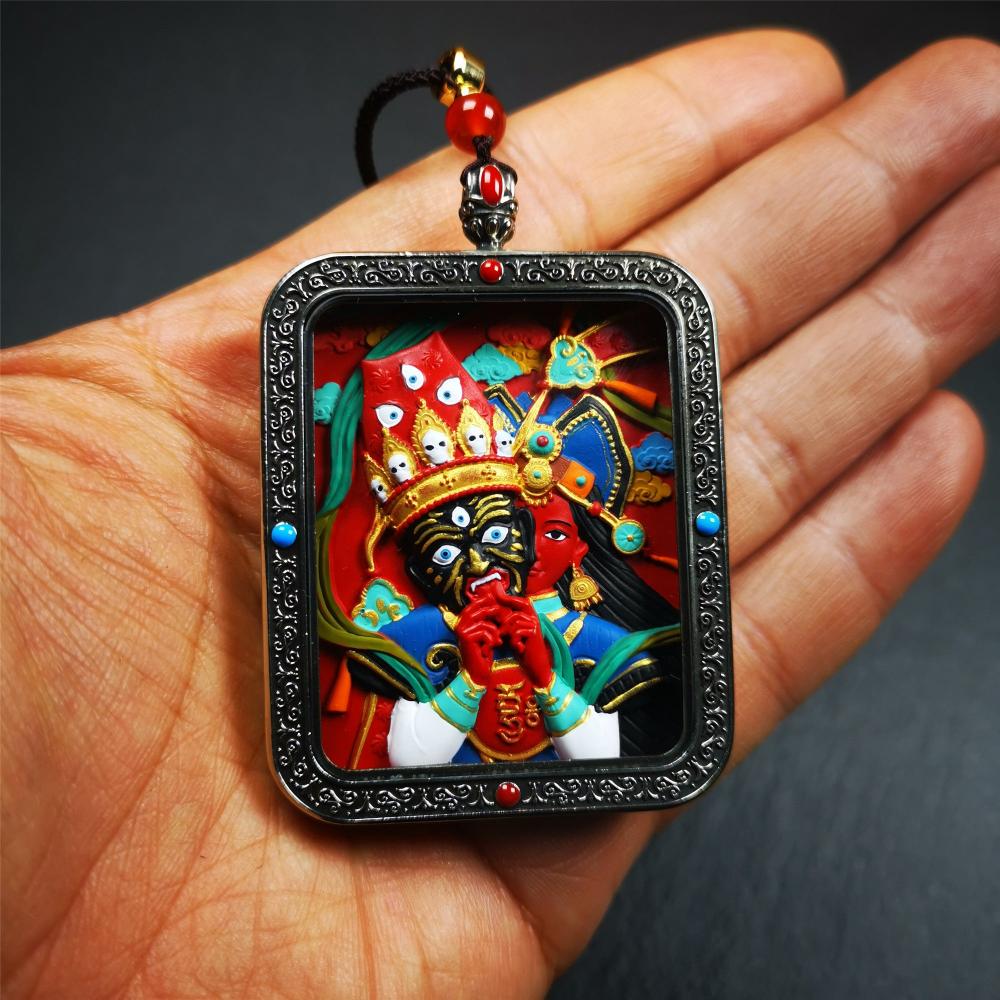This Drashi Lhamo Gau box is made by Tibetan craftsmen in Hepo Township, Baiyu County,filled in a unique fashion Drashi Lhamo Tsa Tsa - Tibetan girl wearing her mask,made of pottery clay,hand painted.