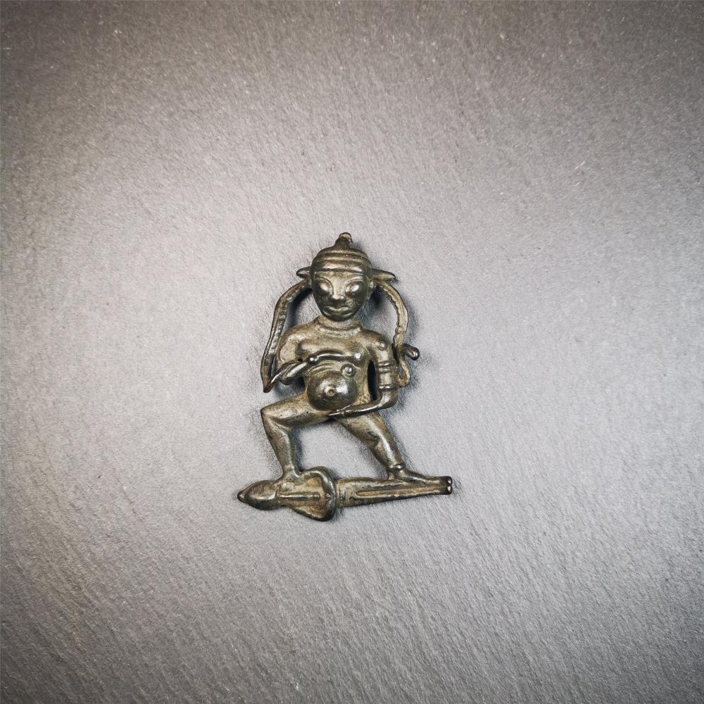 This Black Jambhala(Dzambhala) statue was collected from Goinqên goinba Monastery,Dege Tibet,about 40 years old. It is handmade of thokcha,black color,2.17 inches height and 1.38 inches width. He is the God of Wealth in Tibetan Buddhism.