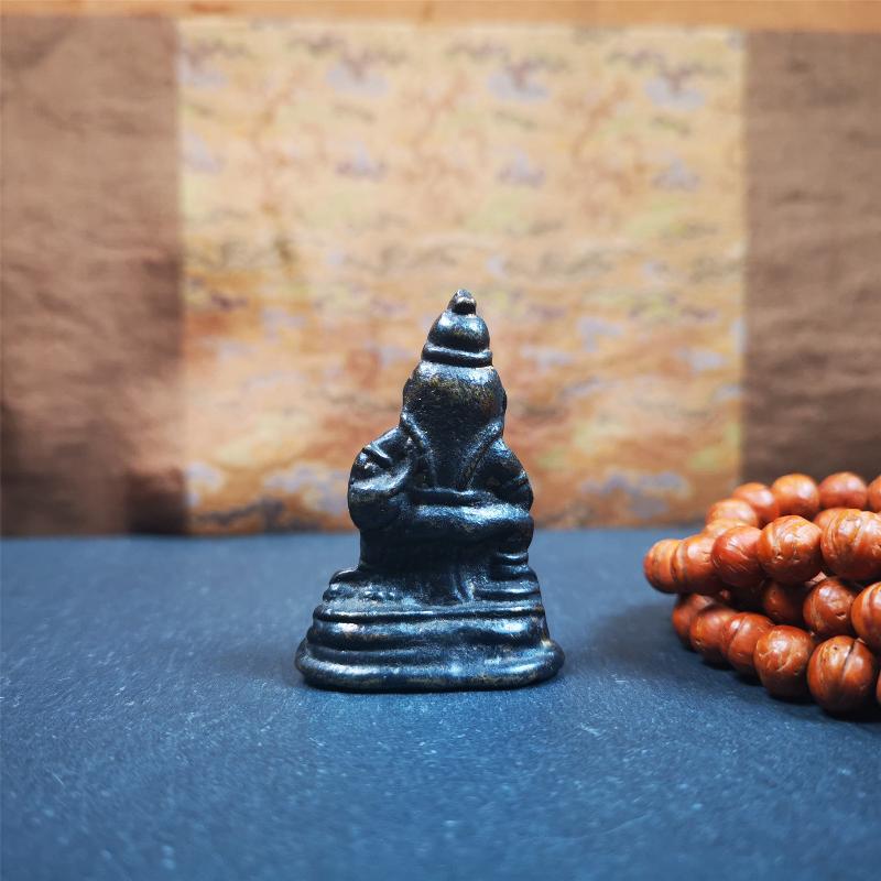 This Yellow Jambhala(Dzambhala) statue was collected from Goinqên goinba Monastery,Dege Tibet,handmade thokcha pendant 80 years ago. It's made of brass,brown color,1.97 inches height and 1.38 inches width.