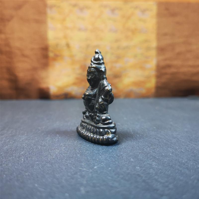 This Yellow Jambhala(Dzambhala) statue was collected from Goinqên goinba Monastery,Dege Tibet,handmade thokcha pendant 80 years ago. It's made of brass,brown color,1.97 inches height and 1.38 inches width.