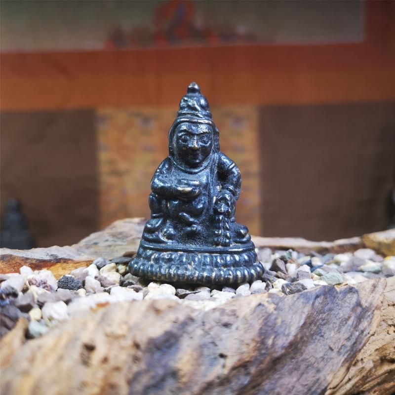 This Yellow Jambhala(Dzambhala) statue was collected from Goinqên goinba Monastery,Dege Tibet,handmade thokcha pendant 80 years ago. It's made of brass,brown color,1.97 inches height and 1.38 inches width.