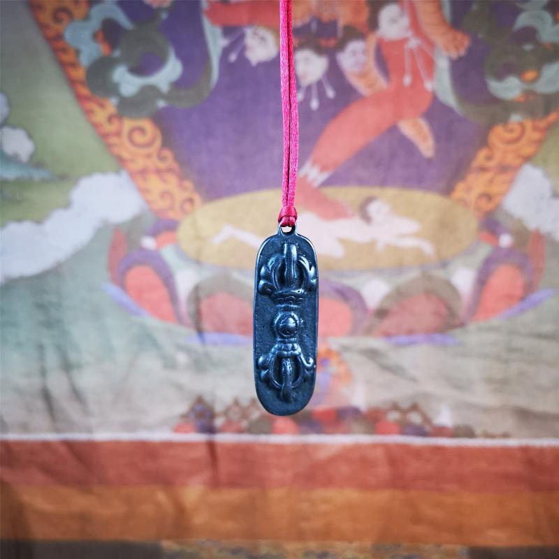 This unique Vajra pendant are collected from Yaqing Monastery,handmade of copper. It has a vajra on the front and the OM mantra of Tibetan Buddhism and the eight treasures tribute on the back. You can make them into necklace, or keychain.