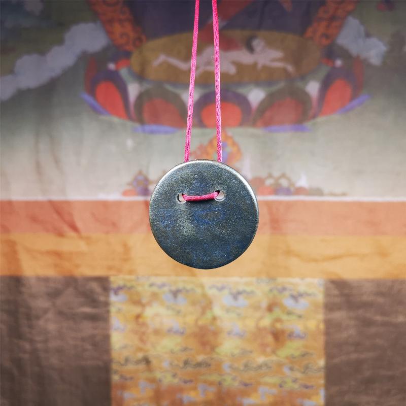 This Usnisa Vijaya statue was collected from Derge,Tibet. It's a badge or pendant,made of copper,brown color, 1.4 inch diameter. You can make it into a necklace,or bag hanging,or just put into your shrine.