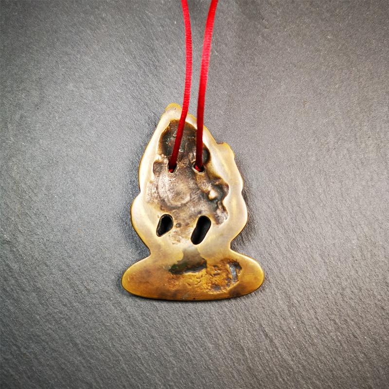 This Vajrasattva statue was collected from Derge,Tibet. It's a badge or pendant,made of copper,brown color, size is 2.24" × 1.57". You can make it into a necklace,or bag hanging