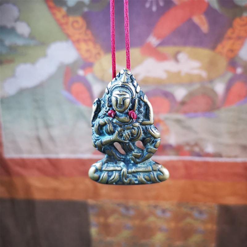 This Vajrasattva statue was collected from Derge,Tibet. It's a badge or pendant,made of copper,brown color, size is 2.24" × 1.57". You can make it into a necklace,or bag hanging