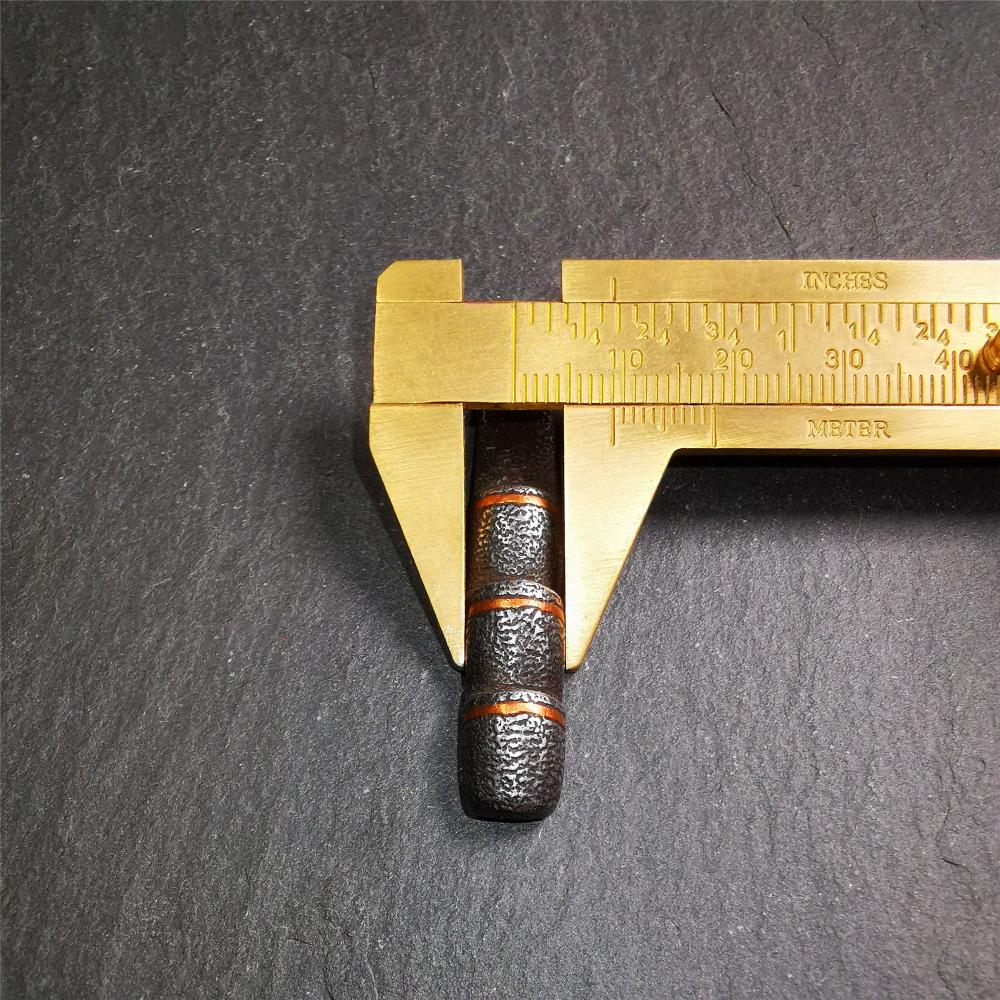 This unique Ladder pendant is made by Tibetan craftsmen. It is made of cold iron and copper, black color,the shape is Tibetan Ladder of Heaven,length is 53mm. You can make it into a pendant,keychain, or just put it on your desk,as an ornament.