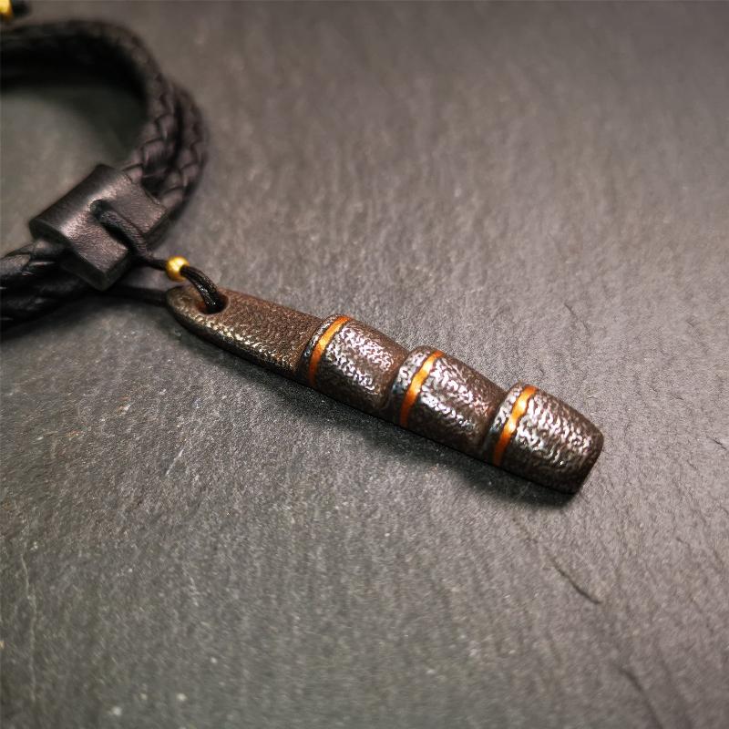 This unique Ladder pendant is made by Tibetan craftsmen. It is made of cold iron and copper, black color,the shape is Tibetan Ladder of Heaven,length is 53mm. You can make it into a pendant,keychain, or just put it on your desk,as an ornament.