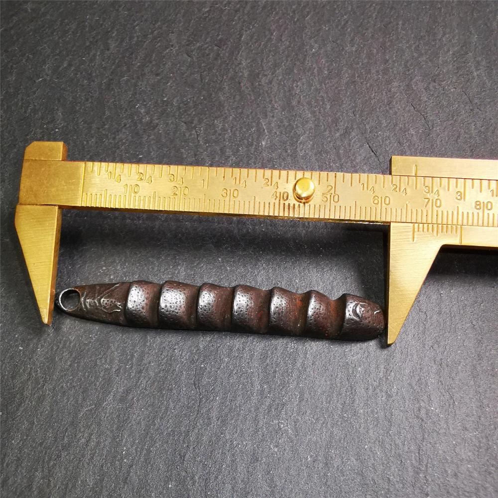 This unique Ladder pendant is made by Tibetan craftsmen. It is made of cold iron and copper, black color,the shape is Tibetan Ladder of Heaven,length is 66mm. You can make it into a pendant,keychain, or just put it on your desk,as an ornament.