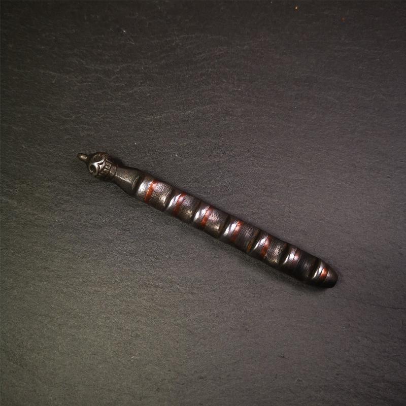 This unique Ladder pendant is made by Tibetan craftsmen in Hepo Township, Baiyu County. It is made of cold iron and copper, black color,the shape is Tibetan Ladder of Heaven,a skull on the top,length is 11cm / 4.33 inches. The ladder of heaven represents that Tibetans can pass their wishes and blessings to their relatives in the sky, and reach the Paradise of Paradise or the Pure Land of Buddhism as soon as possible.