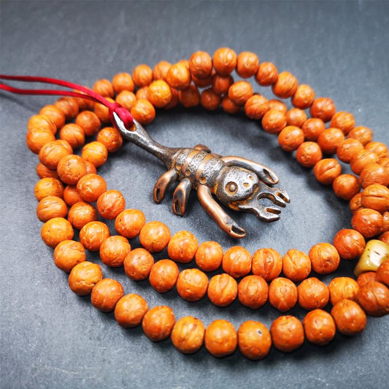This scorpion is handmade by Tibetan craftsmen in Hepo Township, Baiyu County, the birthplace of the famous Tibetan handicrafts. It is made of cold iron,black color, the shape is scorpion guru (from Guru Rinpoche), use the copper inlaid and carved craftsmanship. The eight legs of this scorpion are carved from copper and are inlaid in a body made of thunder iron,a beautiful pattern on the abdomen of the scorpion, exquisite and beautiful craftsmanship.