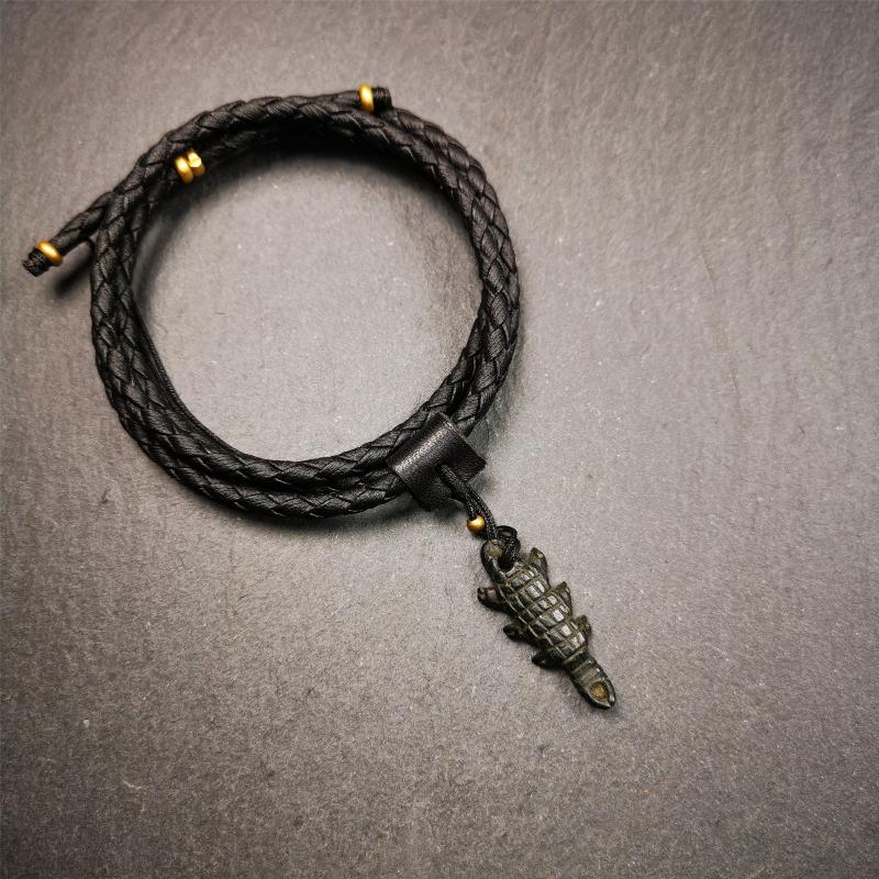 This unique obsidian carved Scorpion Guru pendant is made by Tibetan craftsmen in Hepo Township, Baiyu County, the birthplace of the famous Tibetan handicrafts. It's made of obsidian,black color,1.2 inch height. You can make it into necklace,or mala pendant.