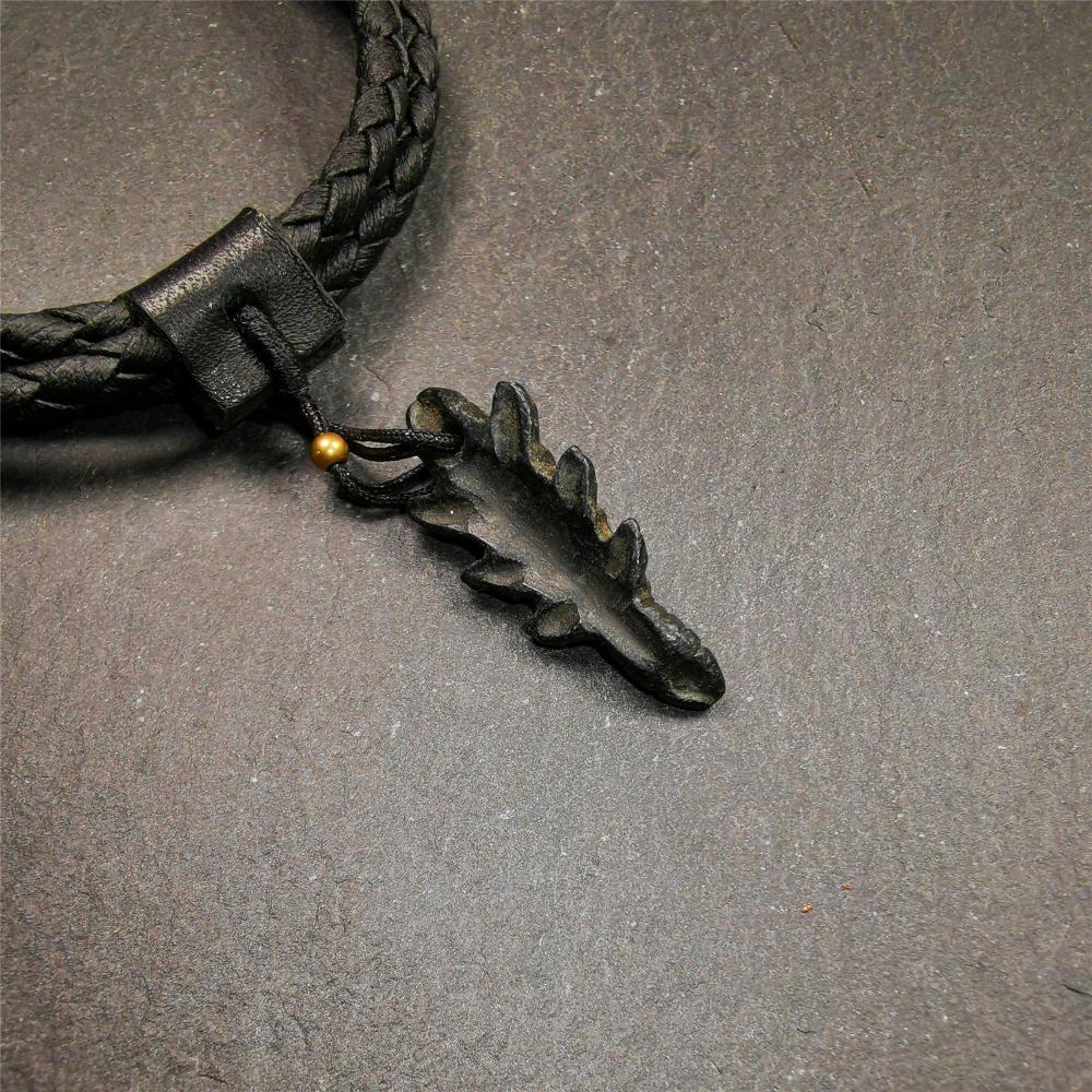 This unique obsidian carved Scorpion Guru pendant is made by Tibetan craftsmen in Hepo Township, Baiyu County, the birthplace of the famous Tibetan handicrafts. It's made of obsidian,black color,1.2 inch height. You can make it into necklace,or mala pendant.