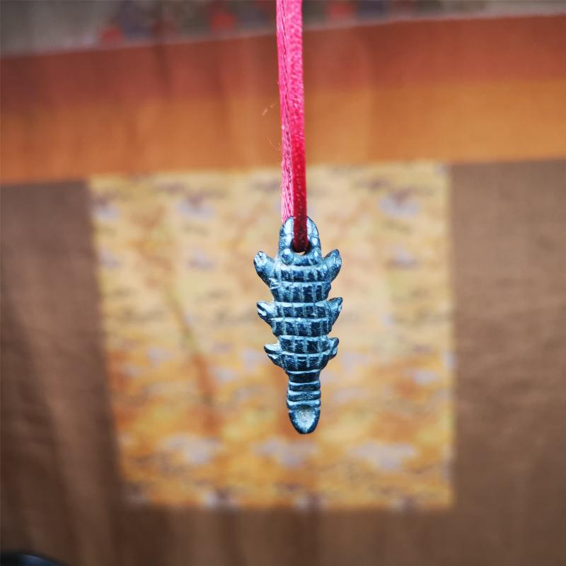 This unique obsidian carved Scorpion Guru pendant is made by Tibetan craftsmen in Hepo Township, Baiyu County, the birthplace of the famous Tibetan handicrafts. It's made of obsidian,black color,1.2 inch height. You can make it into necklace,or mala pendant.