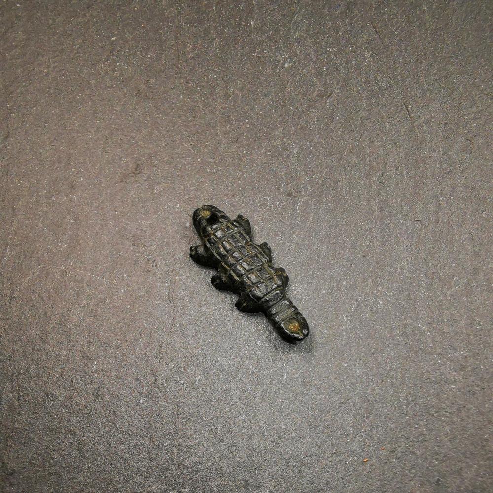 This unique obsidian carved Scorpion Guru pendant is made by Tibetan craftsmen in Hepo Township, Baiyu County, the birthplace of the famous Tibetan handicrafts. It's made of obsidian,black color,1.2 inch height. You can make it into necklace,or mala pendant.