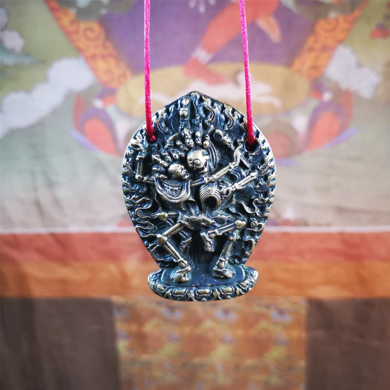 This beautiful Skull Masters of Sitavana statue was collected from Gerze Tibet. It is Masters of Sitavana,the corpse forest owner and his wife stand hugging and standing on the seat cushion. It's made of brass,yellow color,size is 2.1 × 1.8 inches.