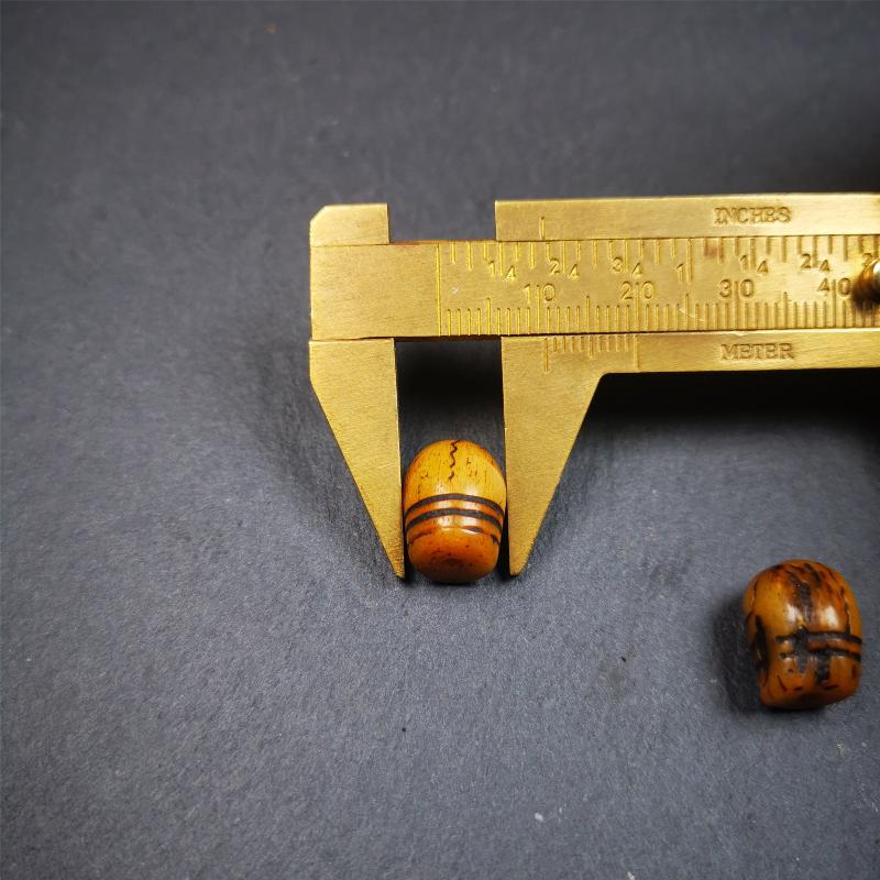 1 Pair of Yak Bone Skull Beads 0.4" - Tibetan Buddhist art, size reference