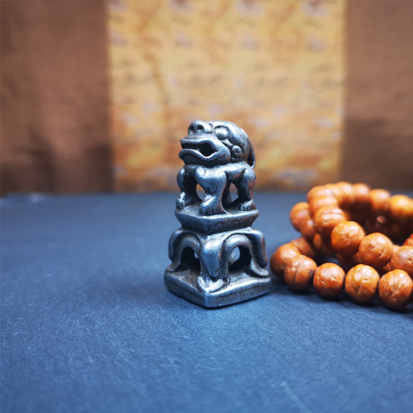 This vintage Kalachakra stamp was collected from Derge Tibet,about 30 years old. It is made of cold iron,carved snow lion,and a Kalachakra pattern at the bottom,size is 1.53 inches.