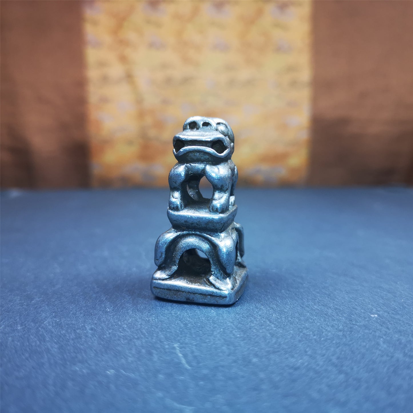 This vintage Kalachakra stamp was collected from Derge Tibet,about 30 years old. It is made of cold iron,carved snow lion,and a Kalachakra pattern at the bottom,size is 1.53 inches.