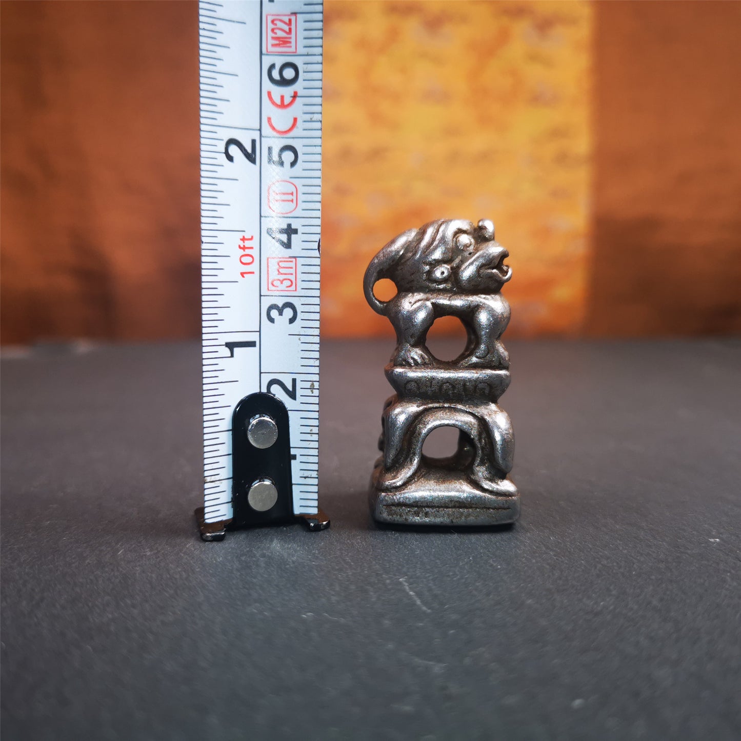 This vintage Kalachakra stamp was collected from Derge Tibet,about 30 years old. It is made of cold iron,carved snow lion,and a Kalachakra pattern at the bottom,size is 1.53 inches.