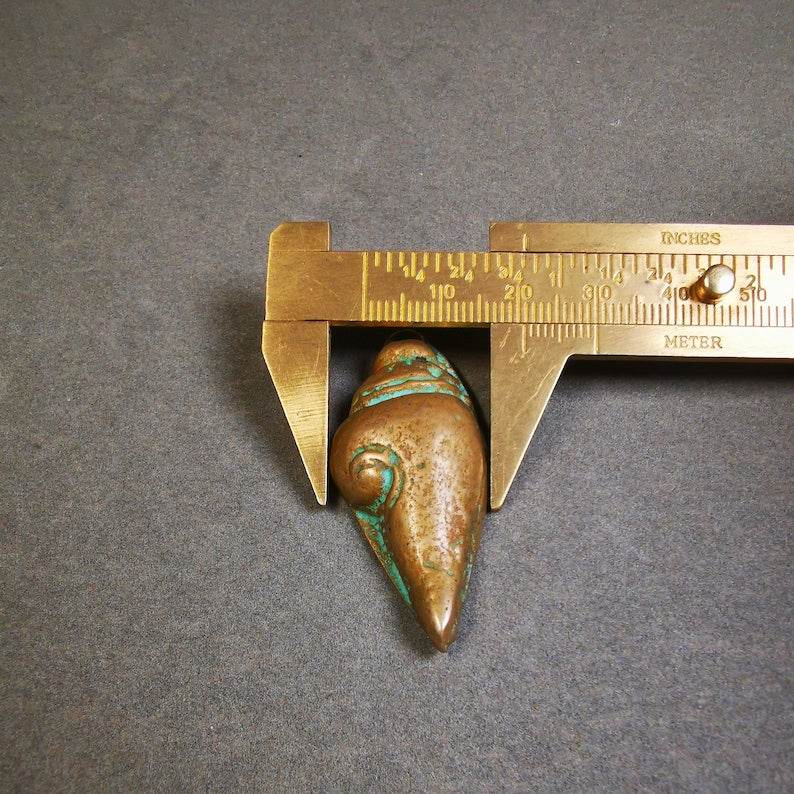 Small Shankha(Divine Conch) Badge,Tibetan Buddhist Protective Amulet Pendant,Made of Lima Brass - Gandhanra-ART