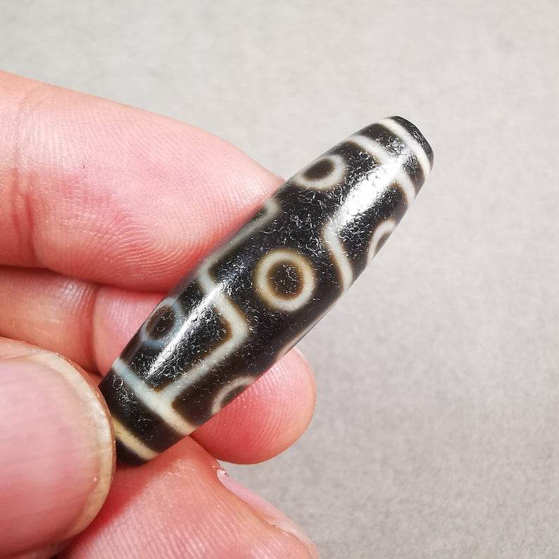 9 Eyed Dzi Bead - Gandhanra-ART