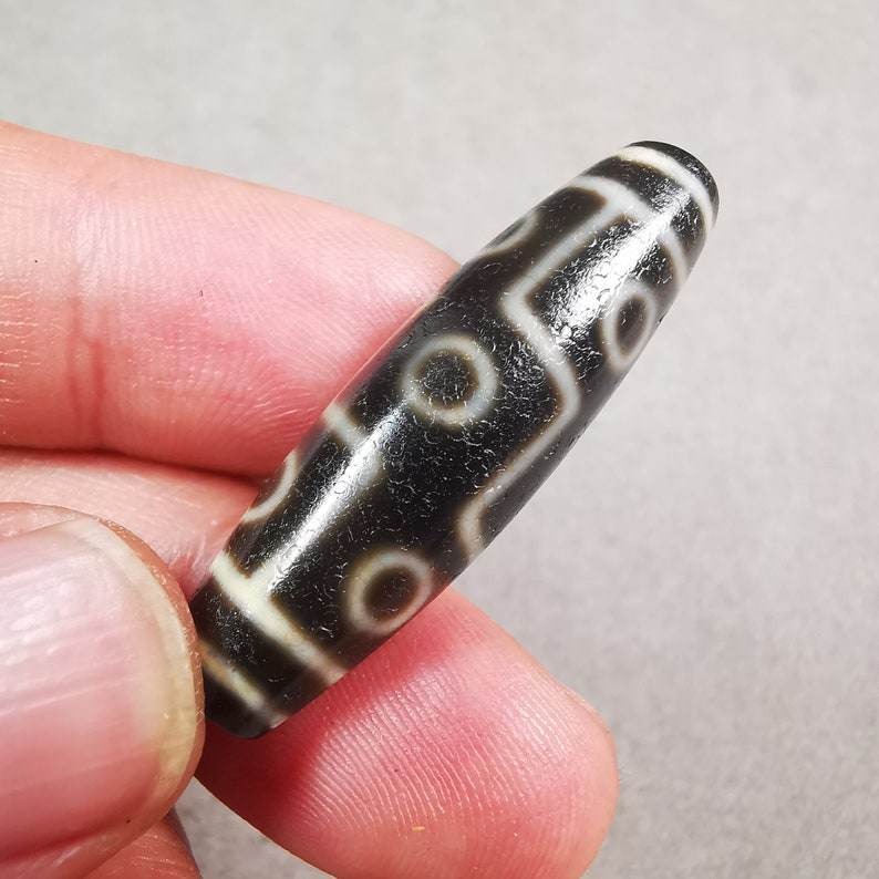 9 Eyed Dzi Bead - Gandhanra-ART
