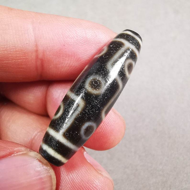 9 Eyed Dzi Bead - Gandhanra-ART
