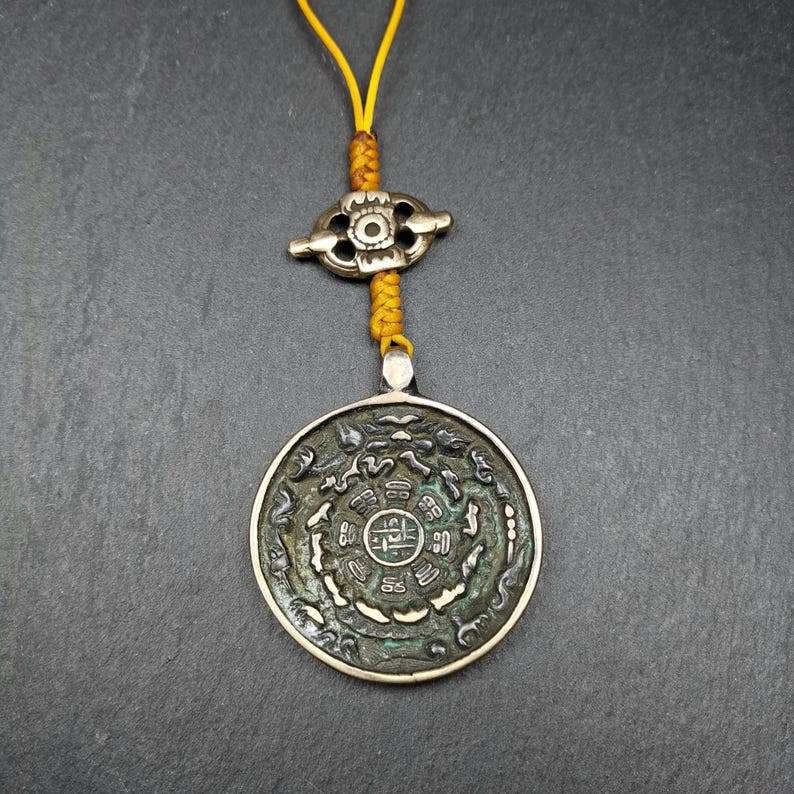 Amulet Sipaho Badge - Melong Mirror Calendar,45mm - Gandhanra-ART