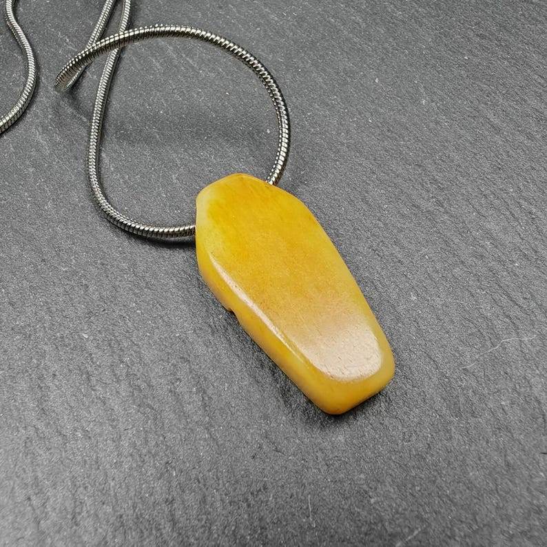 Yak Bone Carved Skeleton Pendant,32mm × 15mm - Gandhanra-ART