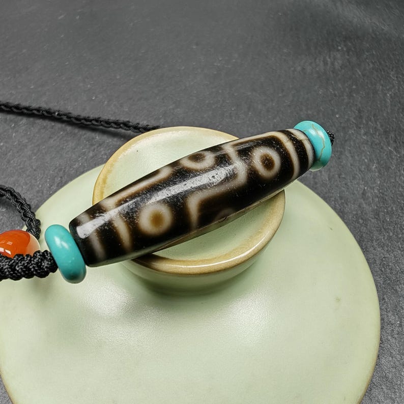 Tibetan 9 Eyes Dzi Bead Necklace | 1.5" x 0.4"