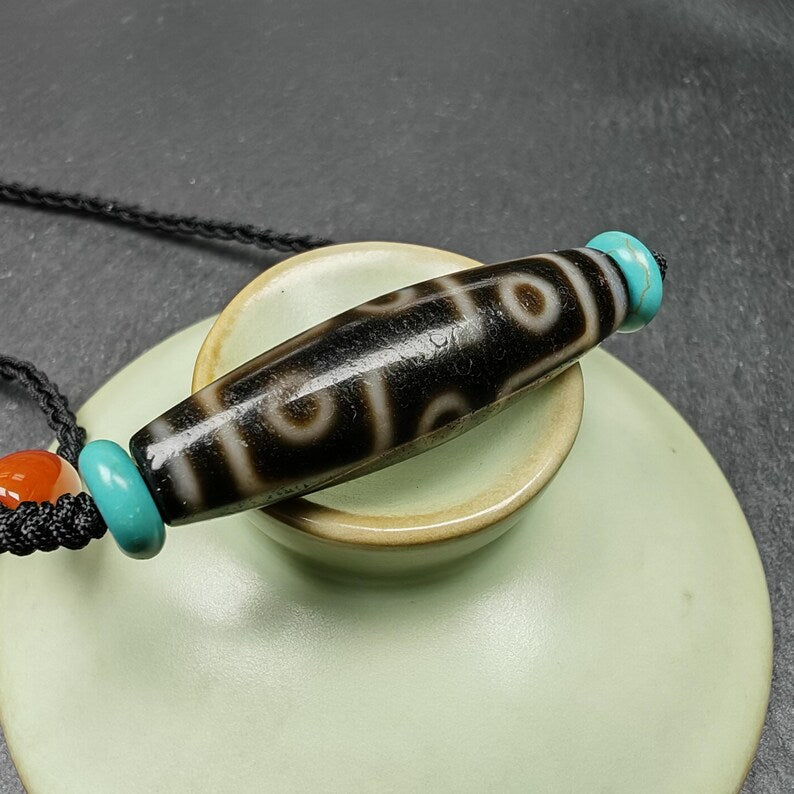 Tibetan 9 Eyes Dzi Bead Necklace | 1.5" x 0.4"