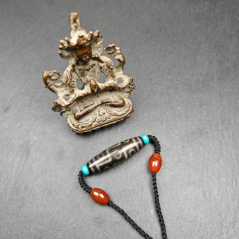 Tibetan 9 Eyes Dzi Bead Necklace | 1.5" x 0.4"