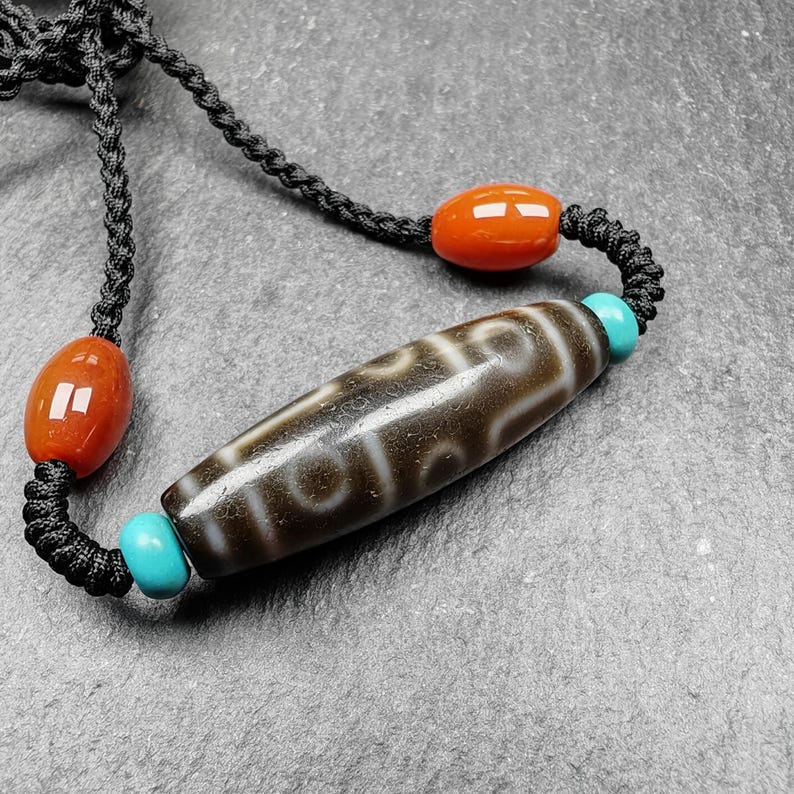Tibetan 9 Eyes Dzi Bead Necklace | 1.5" x 0.4"